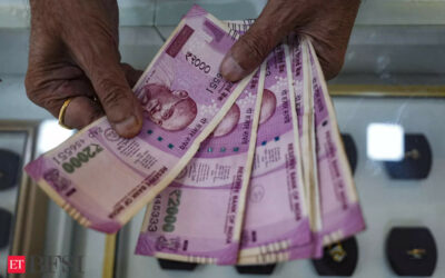 Rupee trades in narrow range against US dollar in early trade, ET BFSI