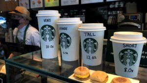 Starbucks unveils expansion plans cost cutting