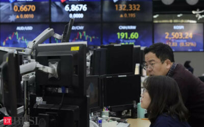 Asian shares turn mixed, gold tops $2,100 an ounce, BFSI News, ET BFSI