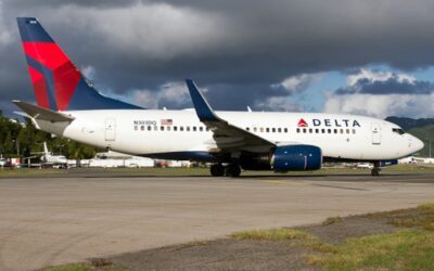 Airline stocks tumble after Delta trims profit forecast