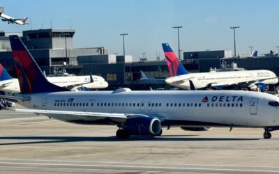 Delta almost doubles Q4 profit, but shares slide on lowered earnings guidance