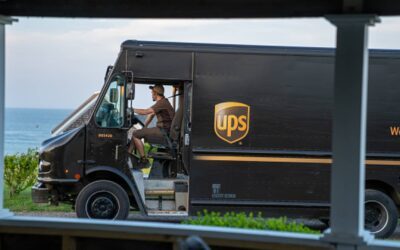 UPS announces 12,000 job cuts; reports drop in package volume