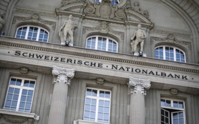 Swiss National Bank makes surprise rate cut, sending franc lower
