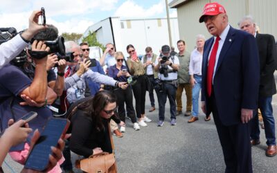 Trump visits Georgia hurricane site, bashes Harris