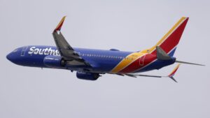 DOT sues Southwest fines Frontier for chronically delayed flights