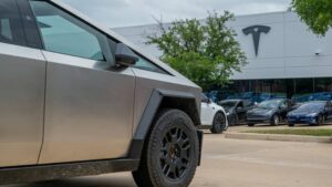 Tesla stock falls after report EV maker is halting production