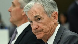 Trump calls Fed chief Powell numbskull as he urges interest