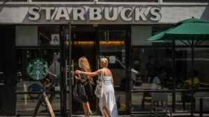 Starbucks to close stores lay off workers in 1 billion